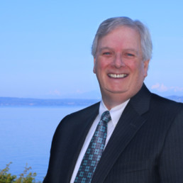 Jeffrey Johnson in a Black Suit Portrait Image